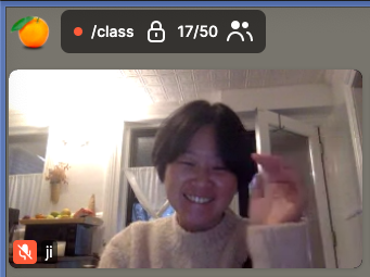 Screenshot of Ji Kim on video chat smiling as part of Fruitful School